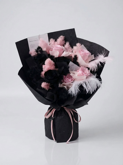 Enchanted Midnight Bloom: Pink & Black Everlasting Rose Arrangement with Feathers